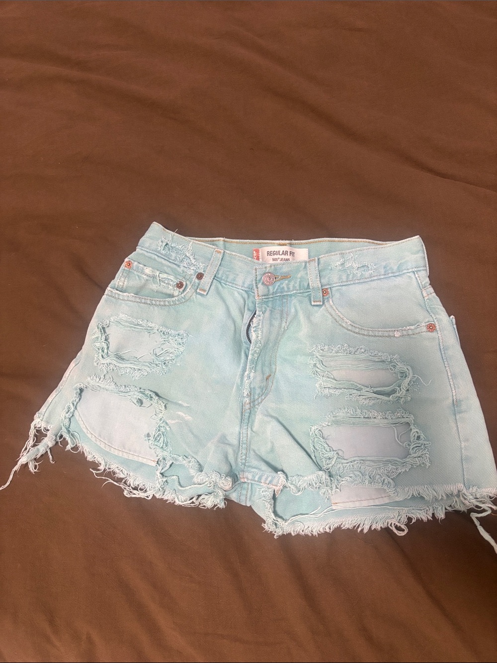 Levi's Light Blue Distressed Denim Cutoff Shorts